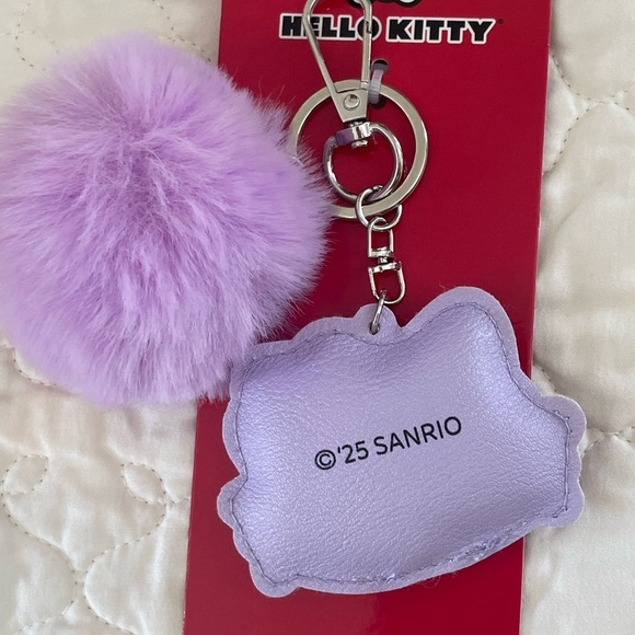 Sanrio Hello Kitty Winking Purple Pom Keychain Bag Charm 2025 New With Tags - Picture 8 of 12